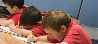 Children taking an exam