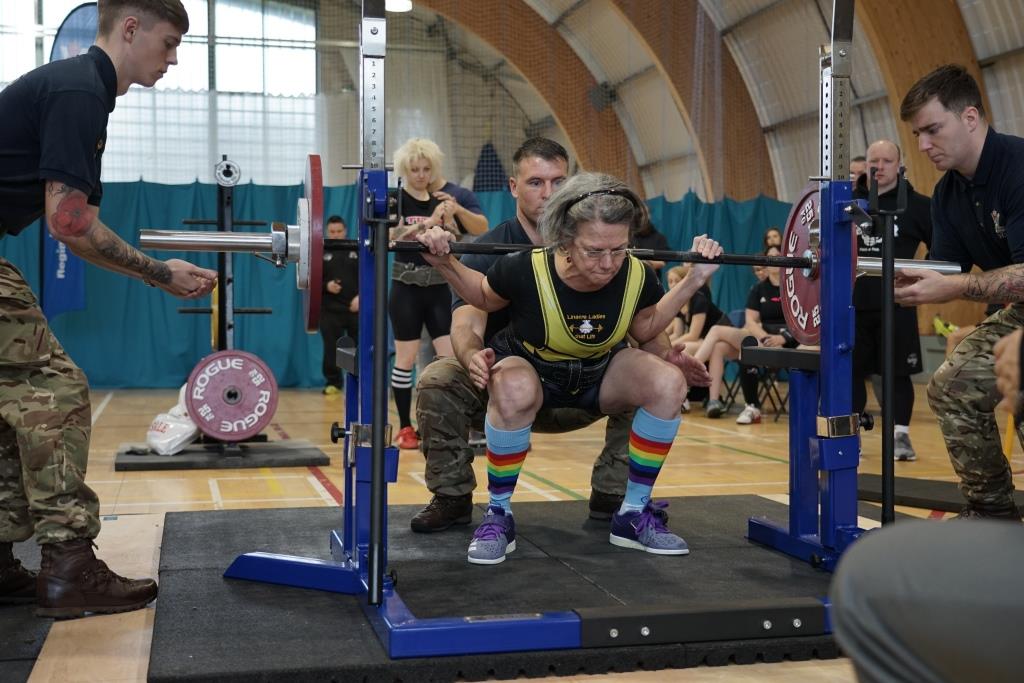 Catherine Walter completing a powerlifting squat