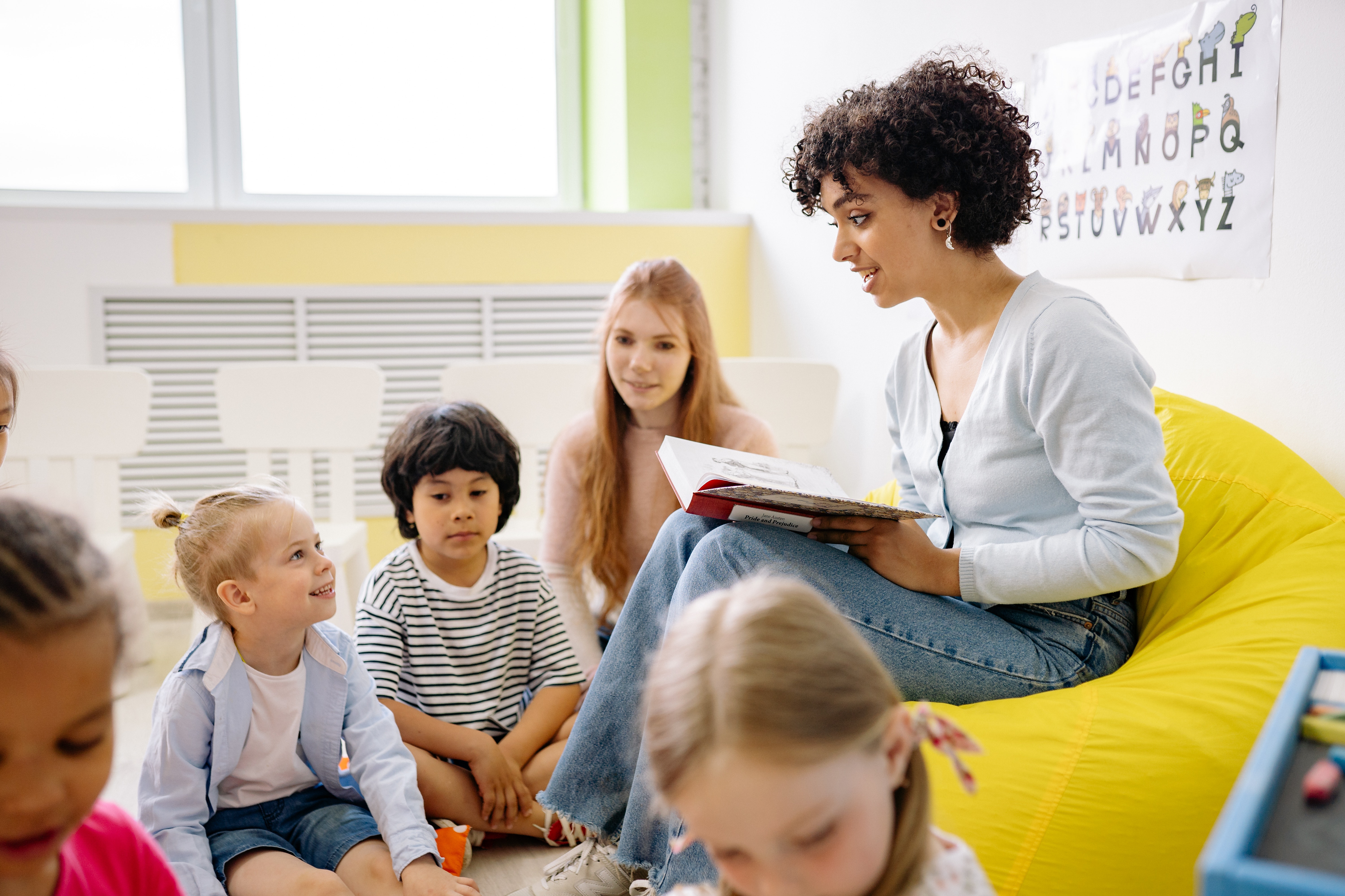 Teacher reading to children