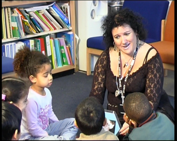 Teacher reading to children